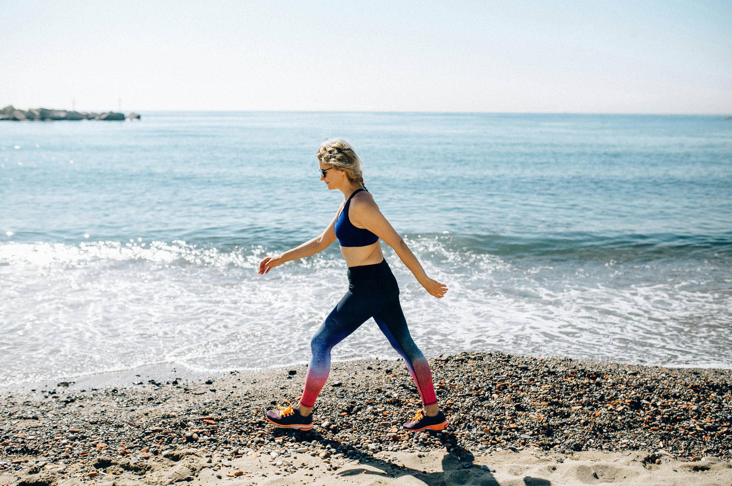 Person walking daily to reduce belly fat naturally at home